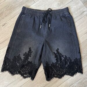NET lace edge jogger shorts
